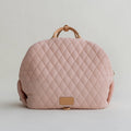 Pink quilted pet handbag back view with top handle and front patch
