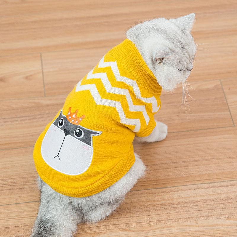 Yellow knit pet sweater with chevron pattern and cute face graphic