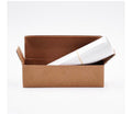 Cat scratching furniture guard roll in brown box with protective white cover