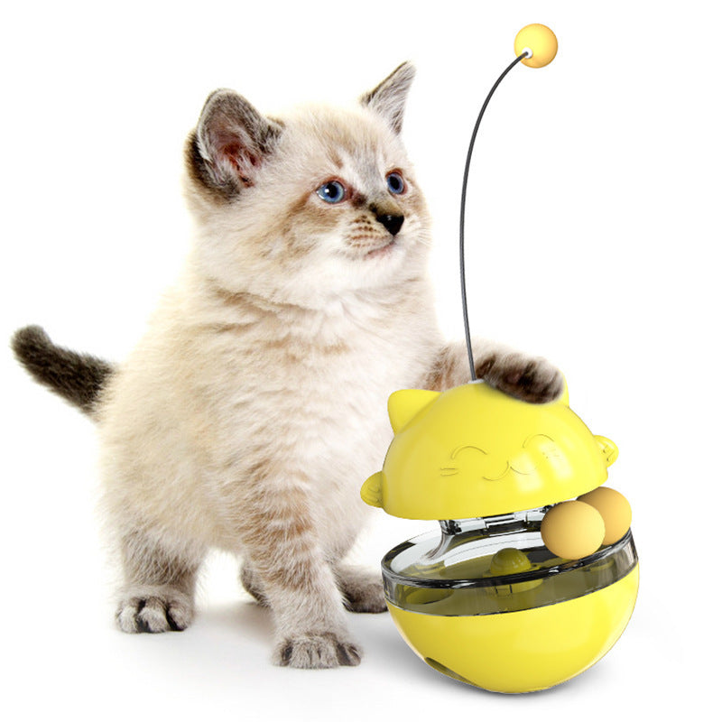 Cat treat dispenser toy in yellow with clear bowl and hanging yellow treat ball