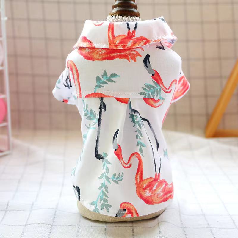 Small-dog pet pajamas, white with red flamingo and leaf print, back view