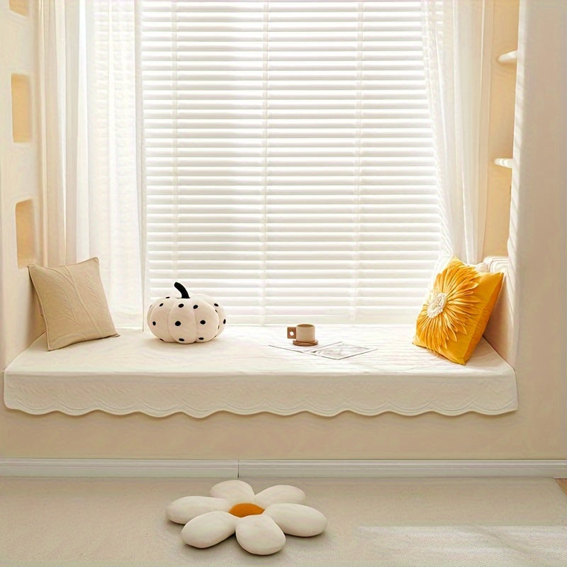 Cream sofa cover with scalloped hem, fitted over a pet-proof seat cushion