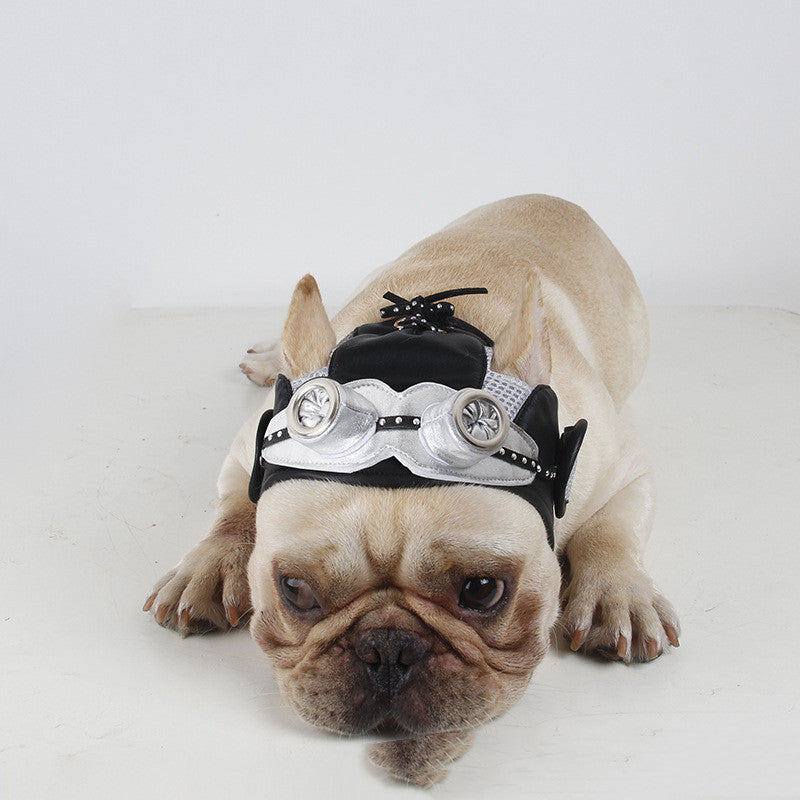 Dog party costume headpiece with silver trim, black top, and large round goggle pieces