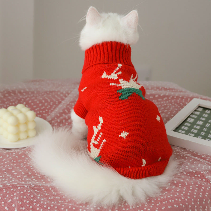 Cat sweater in red knit with white and green holiday-style motifs