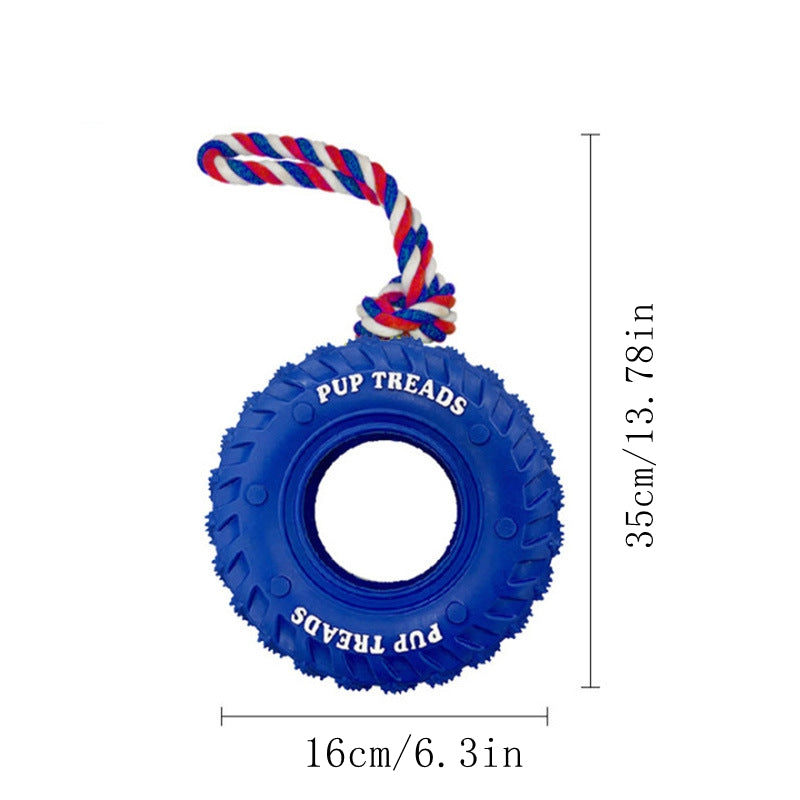 Blue rubber tire chew toy with red, white, and blue rope handle