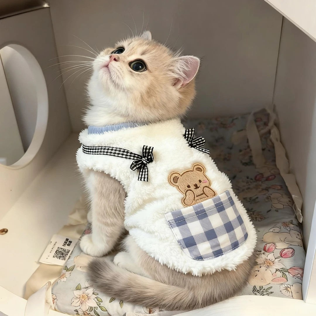 White fleece cat vest with blue plaid pocket, teddy applique, and black bow tie