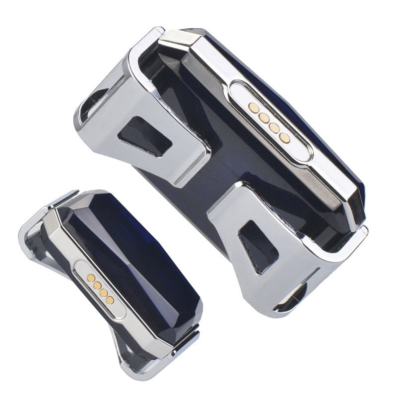 Two black GPS tracker housings with gold charging dots and silver frames