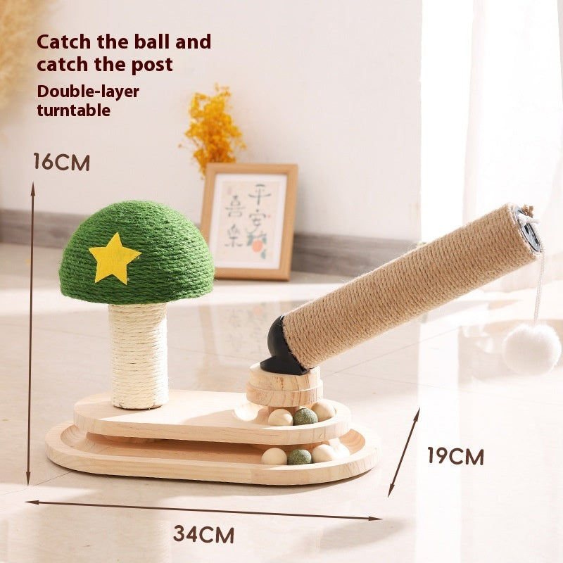 Green star cat scratch turntable with plush top, sisal post, and rotating base