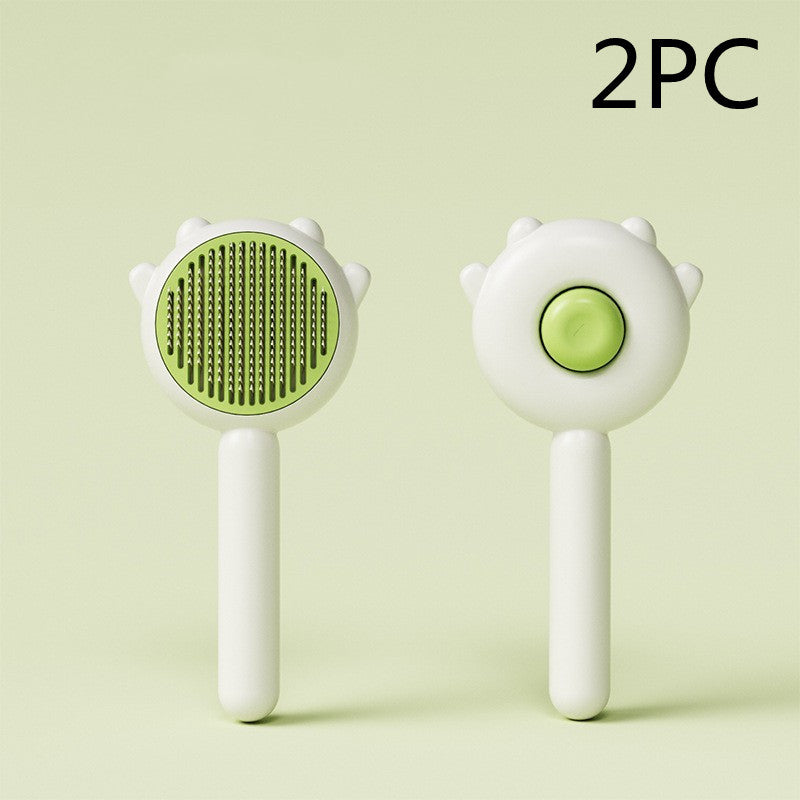 2-piece pet grooming brush set with green bristle and cream paw-shaped handles