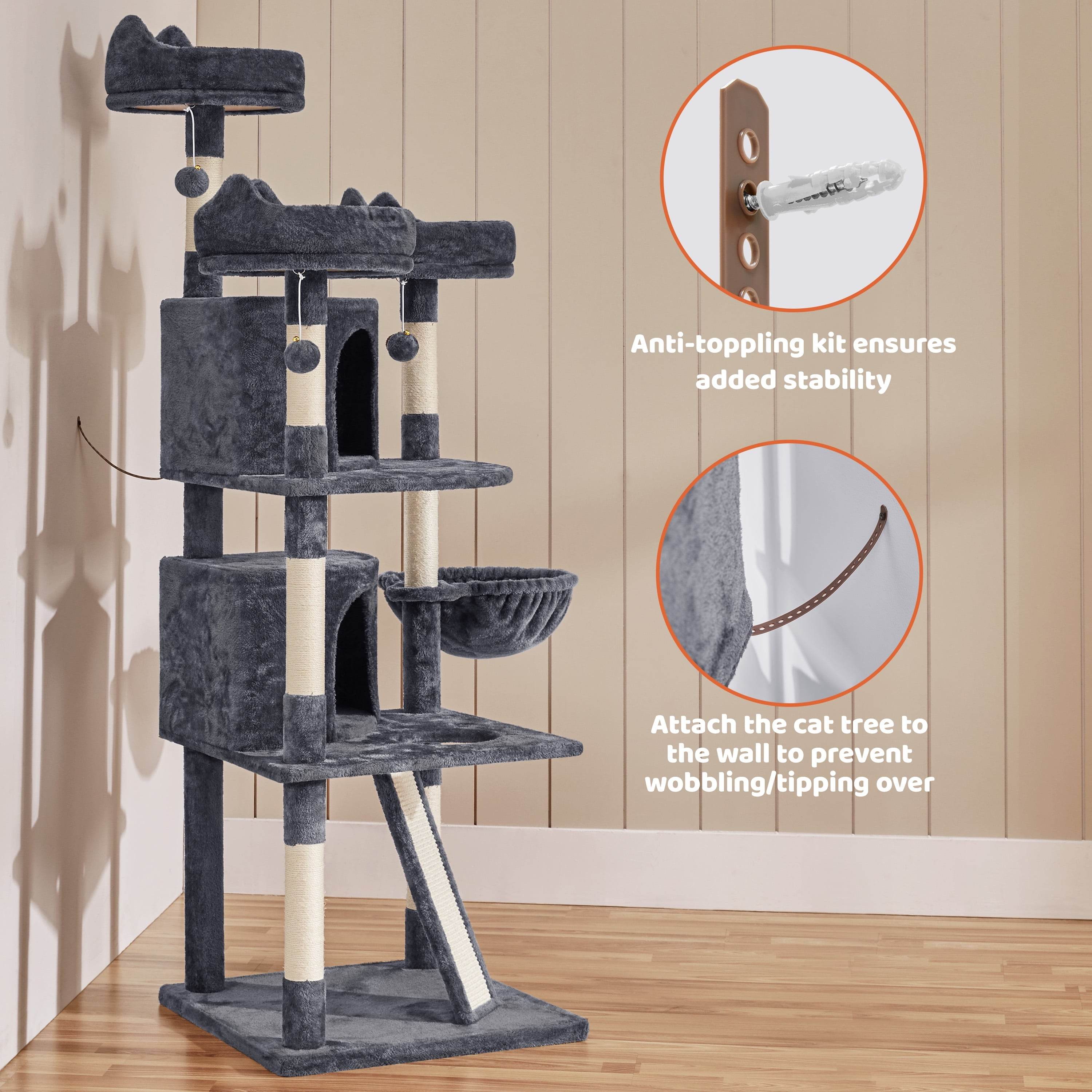 Dark gray cat tree tower with cozy basket and visible anti-tip wall straps