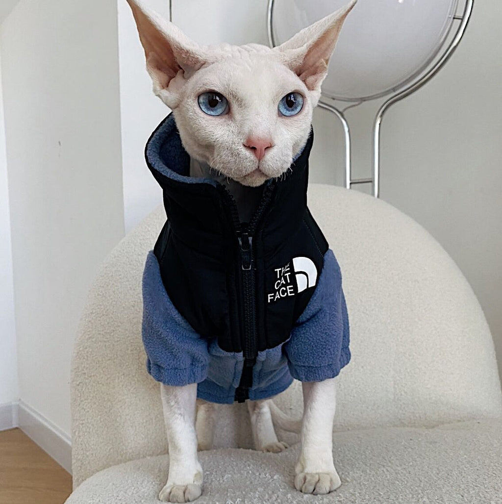 Blue fleece cat jacket with zipper and hood, 'THE CAT FACE' chest patch.