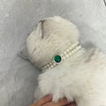 Faux pearl cat collar with round dark green gem centerpiece, silver-tone accents