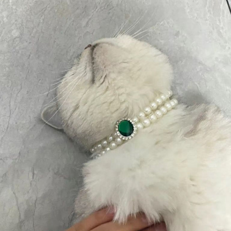 Faux pearl cat collar with round dark green gem centerpiece, silver-tone accents