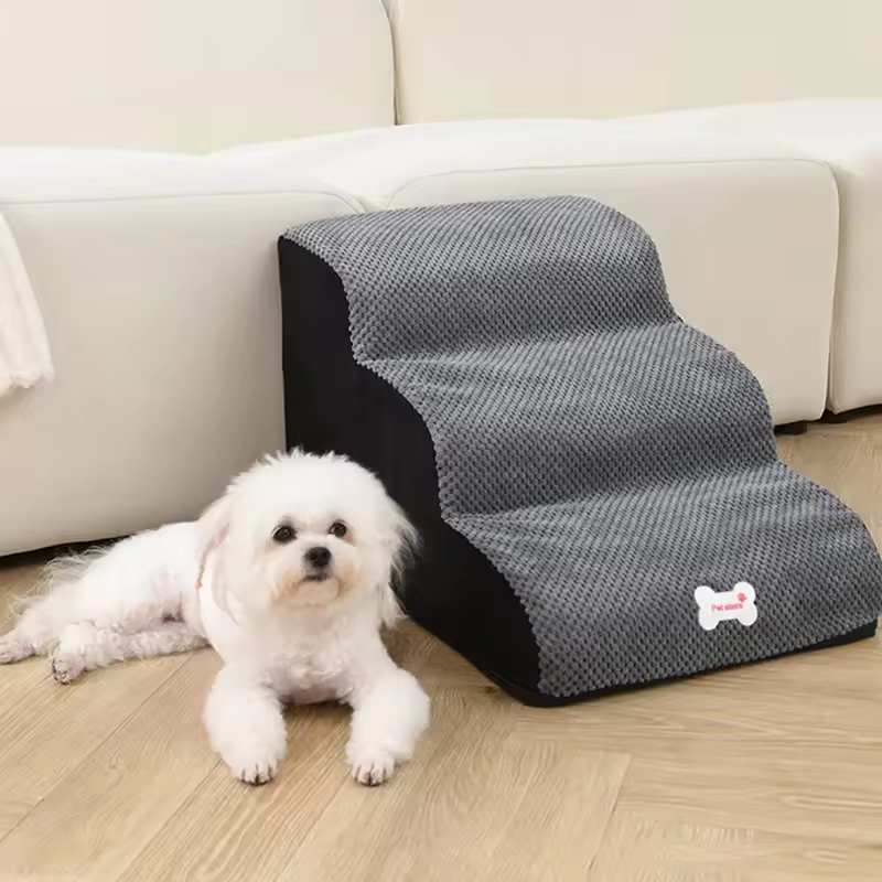 Grey 3-step pet stairs for sofa access with textured sponge surface and dark base