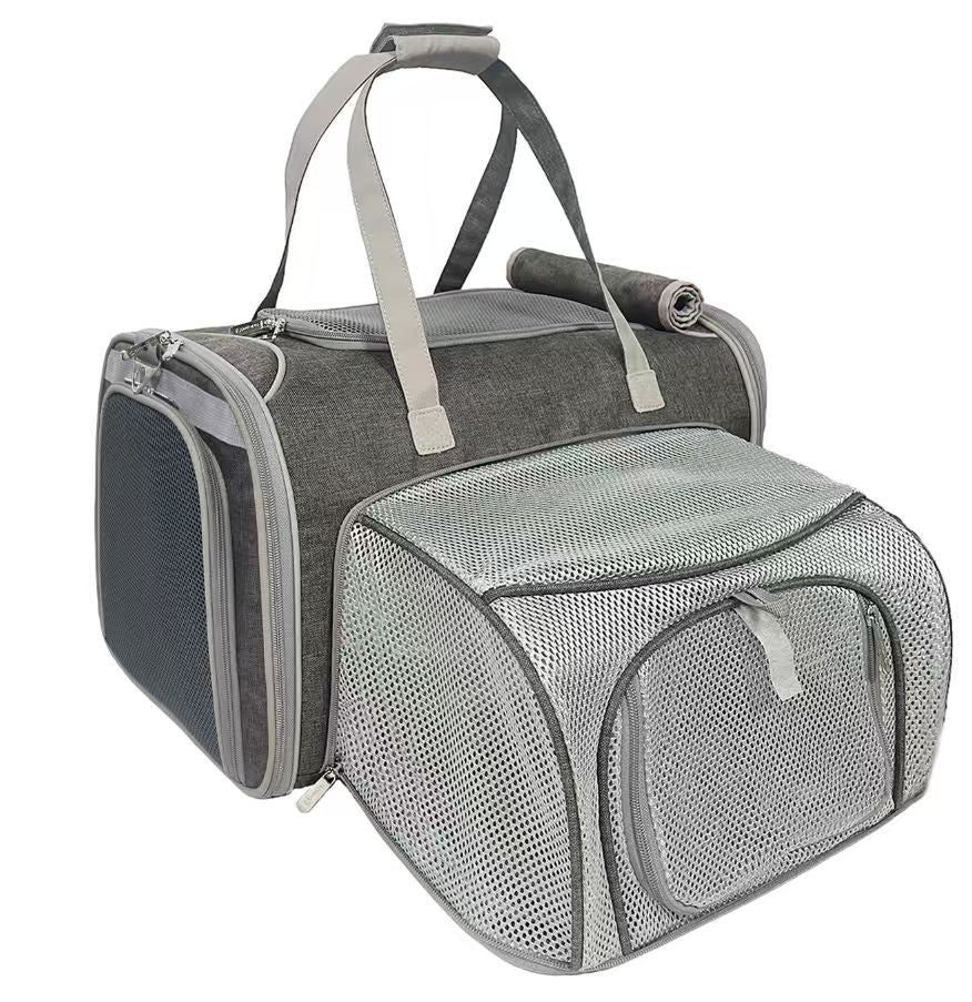 Charcoal ash pet carrier with expandable mesh panels, front zip door and side straps
