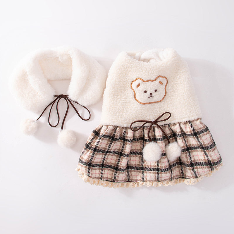 Beige plush pet dress with bear outline applique, plaid skirt, and lace-up hood ties