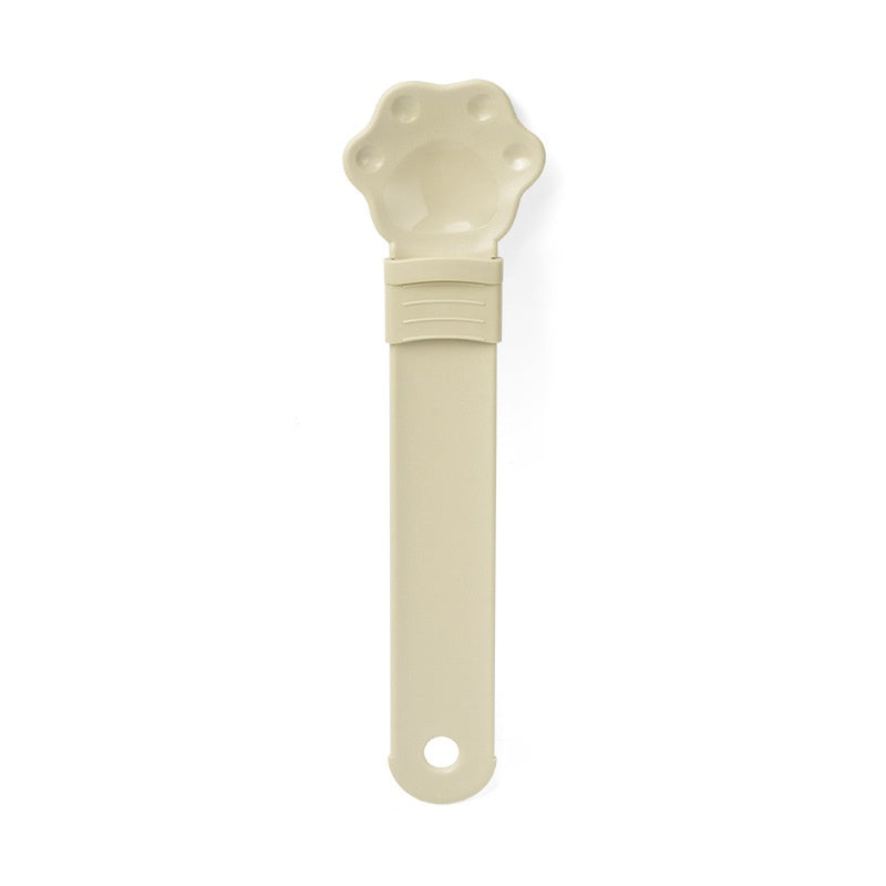 Cat treat squeeze spoon with cat-shaped tip, light cream