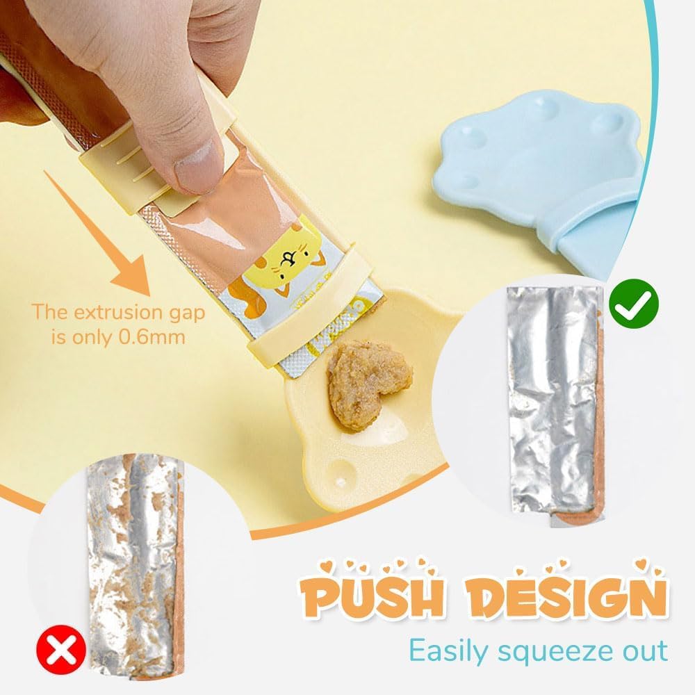 Cat treat squeeze spoon with paw-shaped yellow tip and comfort grip handle