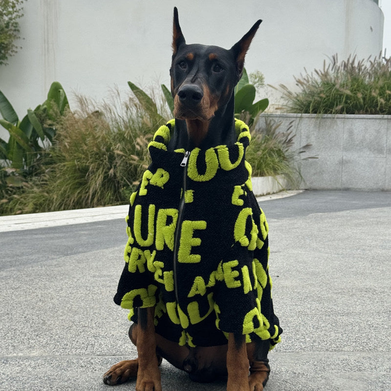 Black dog hoodie with bright green and yellow graphic text and pullover hood.