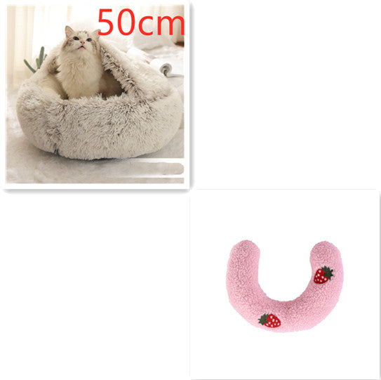 Gray round plush pet bed with cat; pink U-shaped bolster with strawberry patches