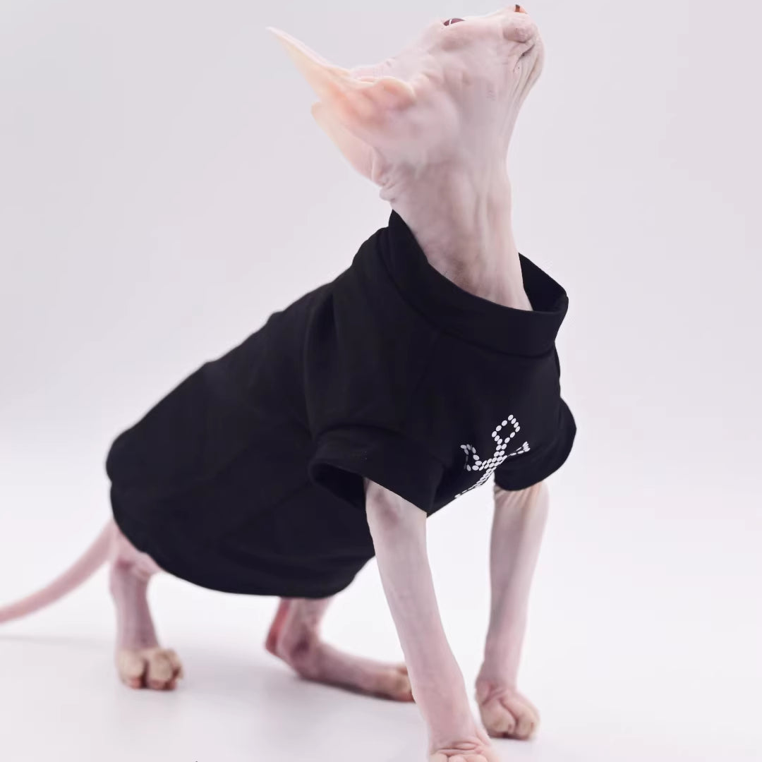 Black cat vest with gemstone-style cross logo, short sleeves and round neck