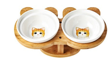 Ceramic cat bowl set with two white bowls featuring an orange cat face design.