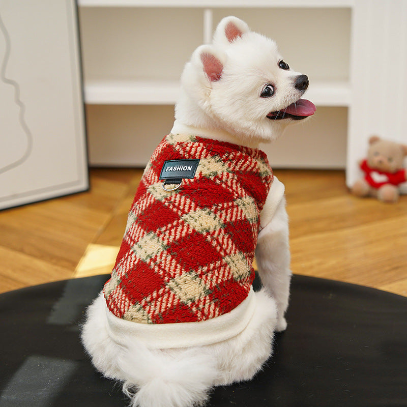 Plaid polar fleece dog jacket with leash ring, red-and-cream diamond pattern.