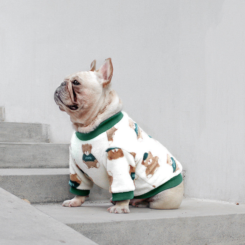 Fleece dog pajamas in white with green trim and small character prints