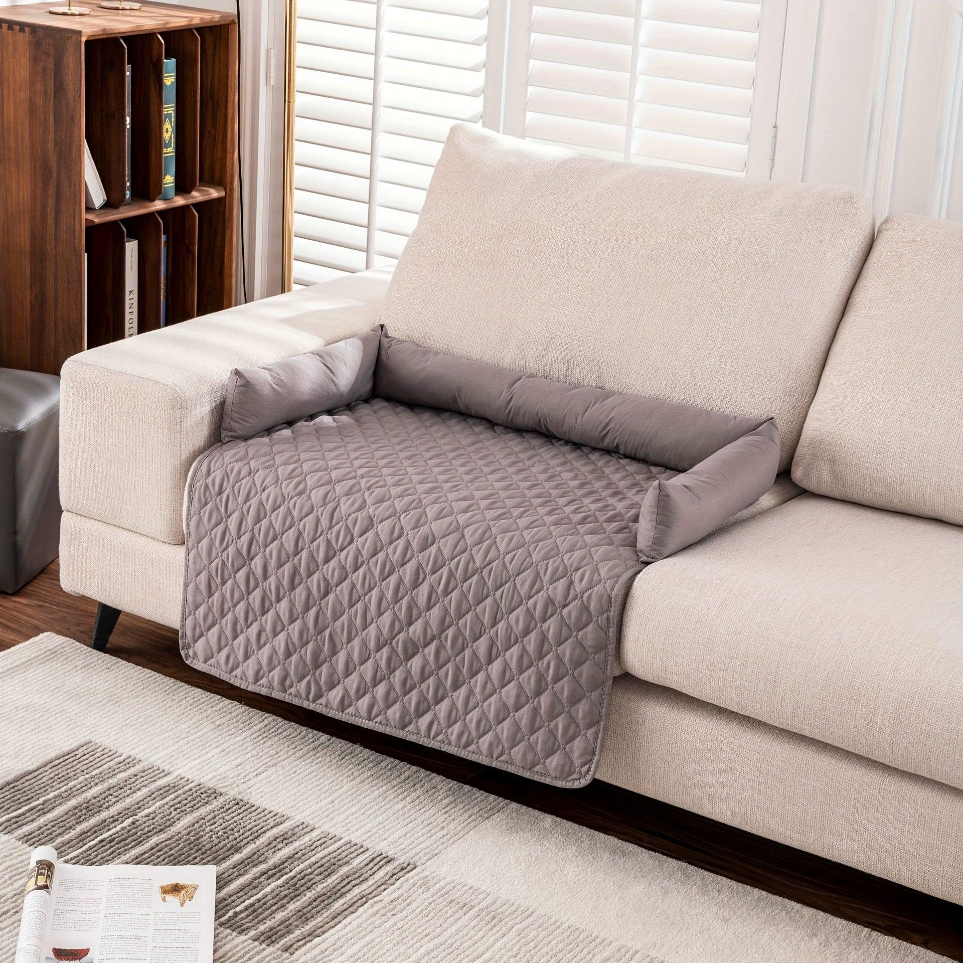 Quilted pet sofa cover mat with gray bolsters and light gray textured bed panel