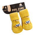 Pair of knit dog socks, yellow with blue-eyed bear face patches and ribbed cuffs.