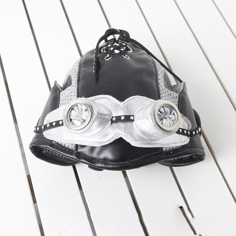 Black pilot dog hat with silver round goggles, laced crown and studded strap