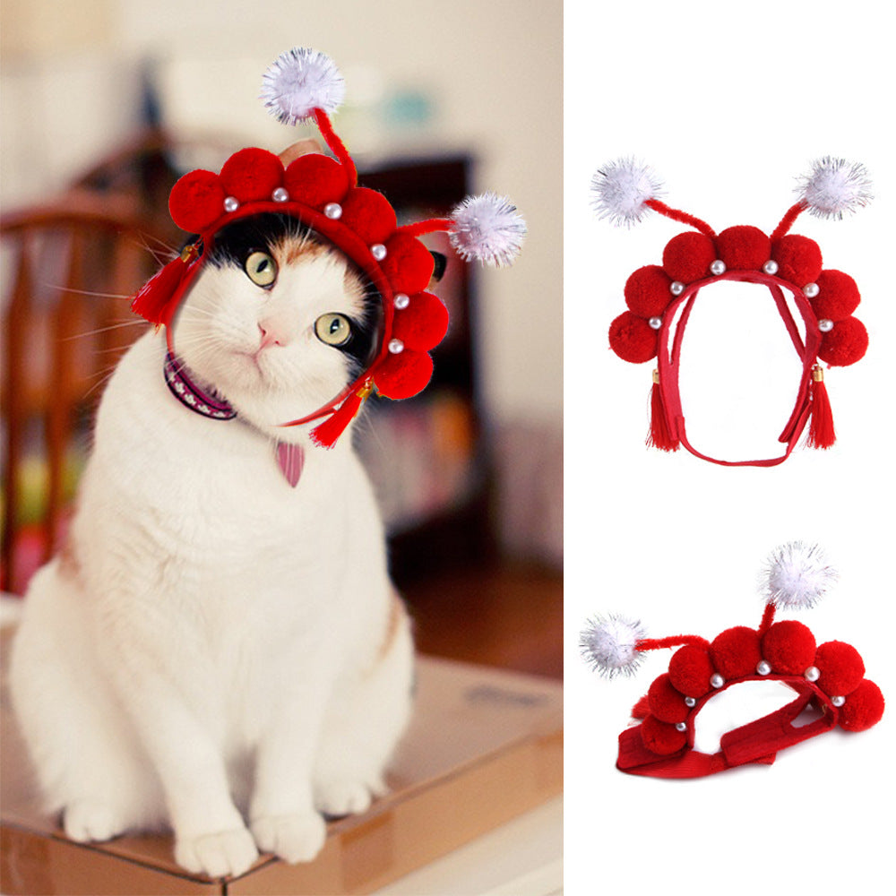 Pet cat hat with red flower crown and white pom-poms