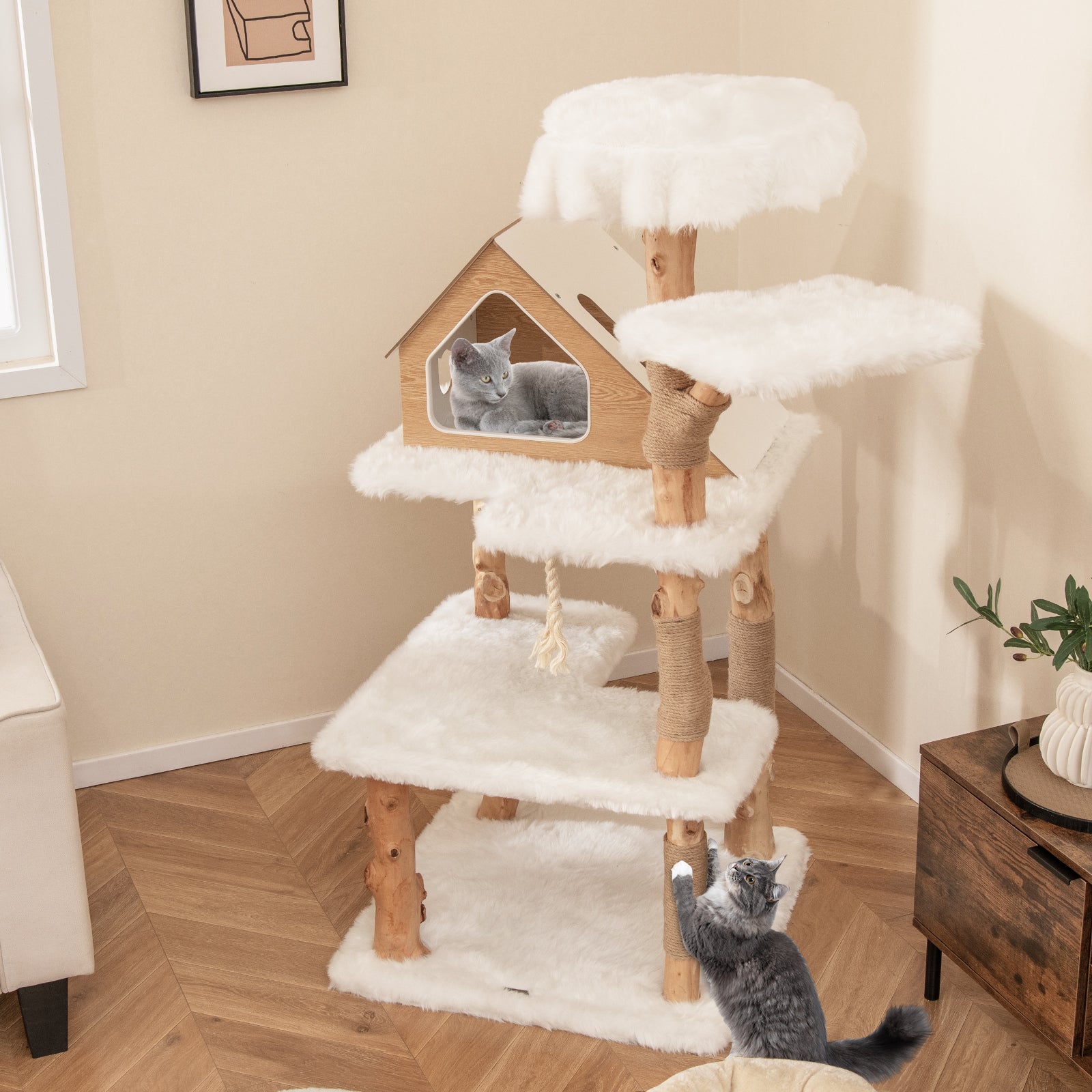 White faux-fur cat tree with enclosed house perch, multiple platforms, and posts