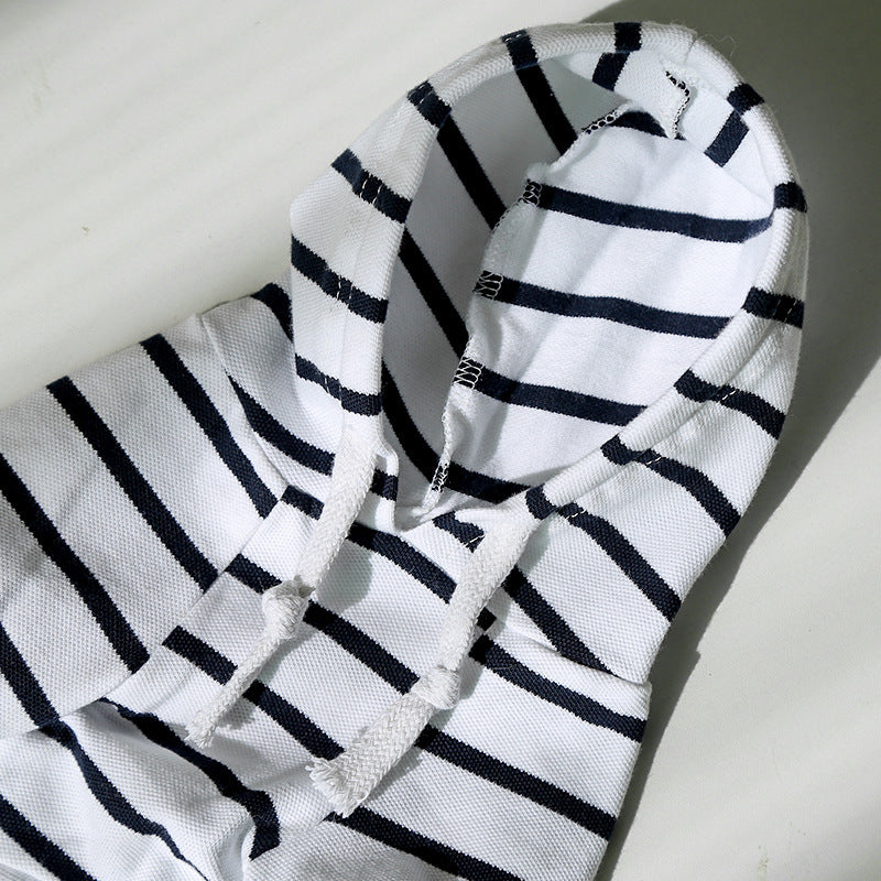 Striped pet hoodie hood detail on white knit with black stripes and drawstring cords