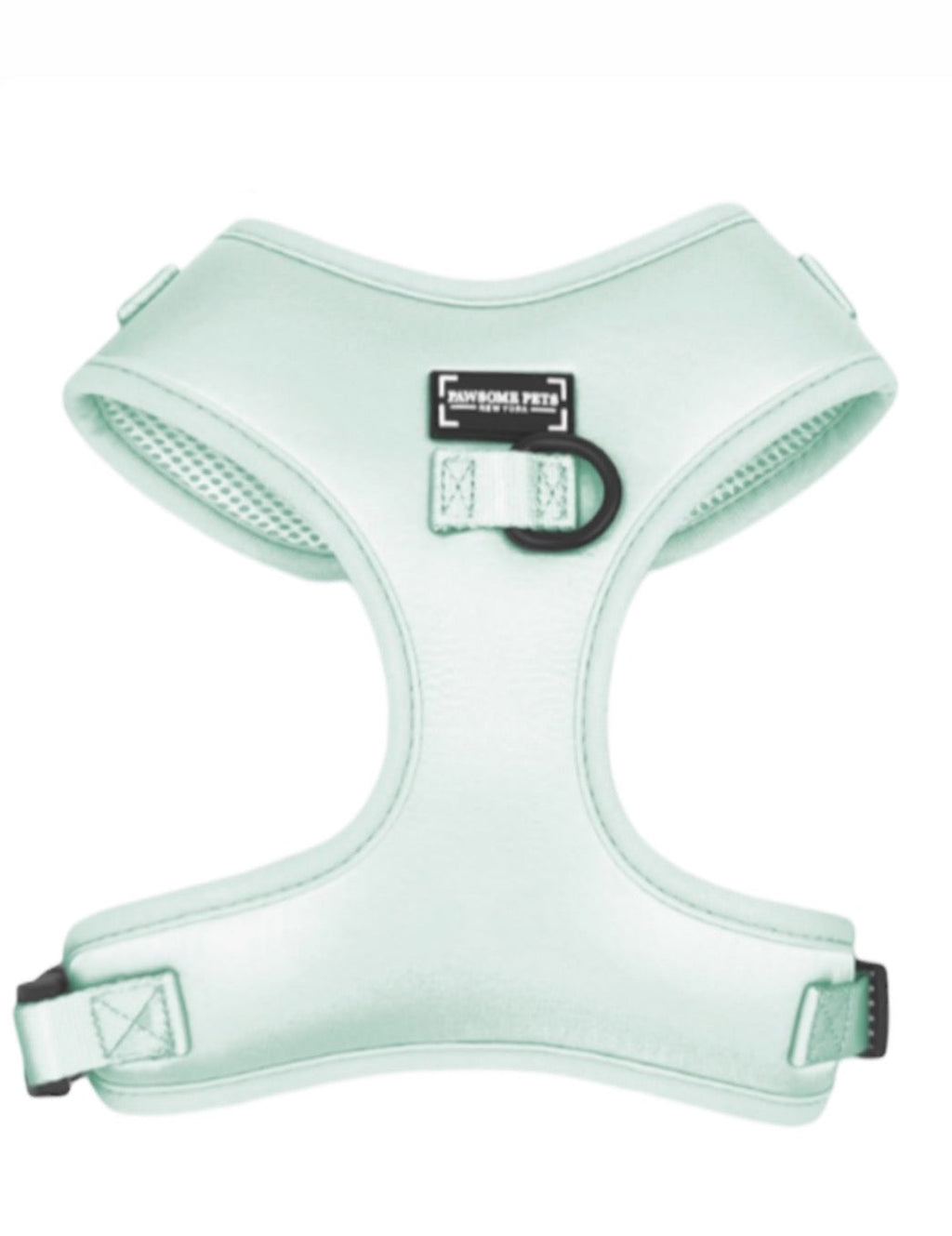 Mint green step-in harness with front strap and brand patch, close-up