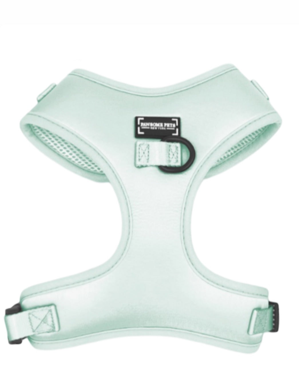 Mint green step-in harness with front strap and brand patch, close-up
