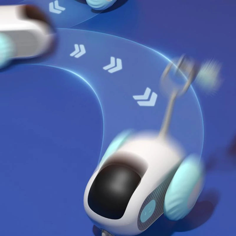 White and black automatic cat car toy with blue side panel, showing motion lights