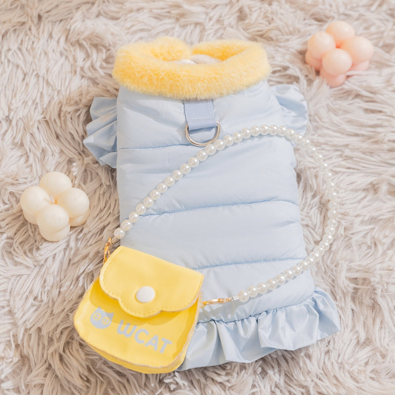 Light blue puffer pet outfit with pearl trim, ruffled sleeves, and yellow collar accents