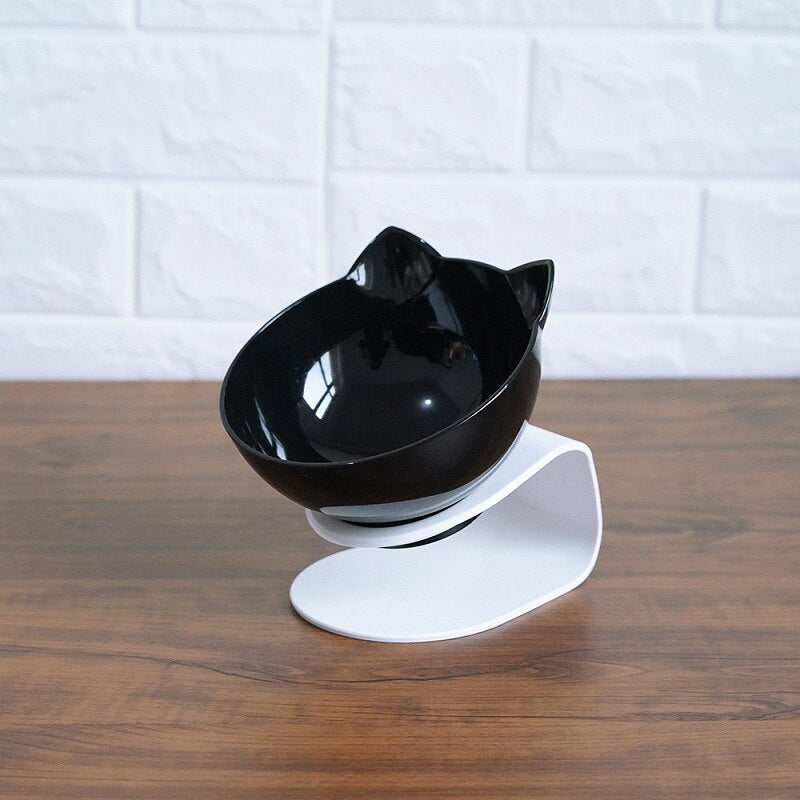 Black cat-shaped raised pet food bowl on white stand, non-slip base