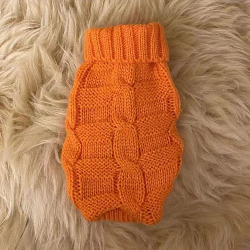 Knitted cat sweater in orange with ribbed turtleneck and textured block pattern