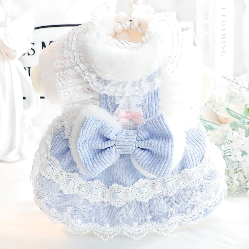 Small pet dress in blue and white with lace hem and large blue bowknot at the waist