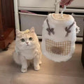 Cat fleece sweater in white with gingham pocket and black bow trim