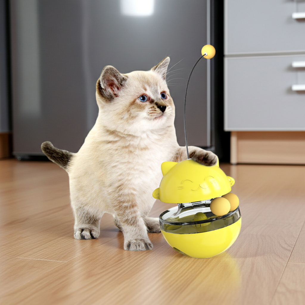 Cat treat dispenser toy in yellow with clear bowl and hanging yellow treat ball