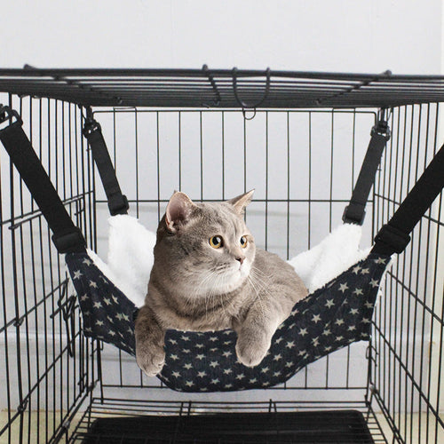Lamb fleece cat hanging bed hammock with navy star pattern and white fuzzy cushion