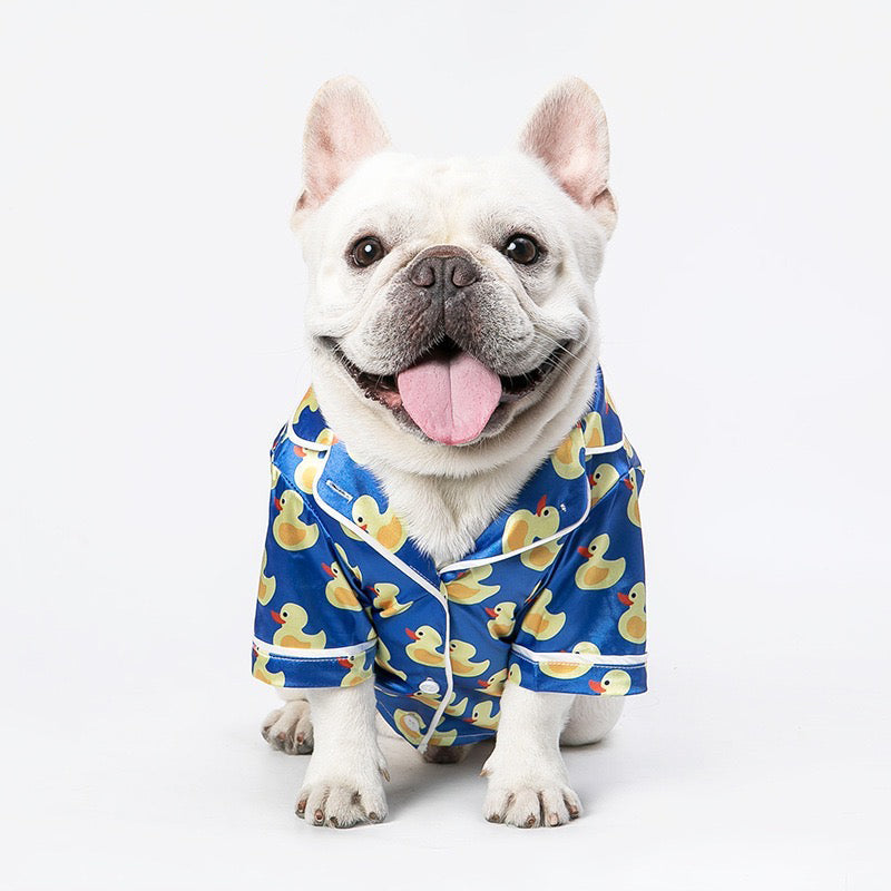 Blue duck-print pet jacket with short sleeves and front button placket