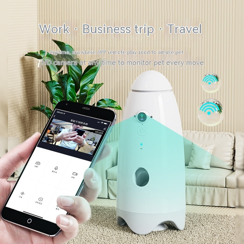White and teal smart pet feeder with camera, shown next to smartphone