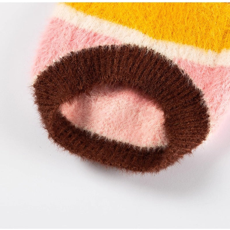 Striped knit cuff, brown edging over pink and yellow panel