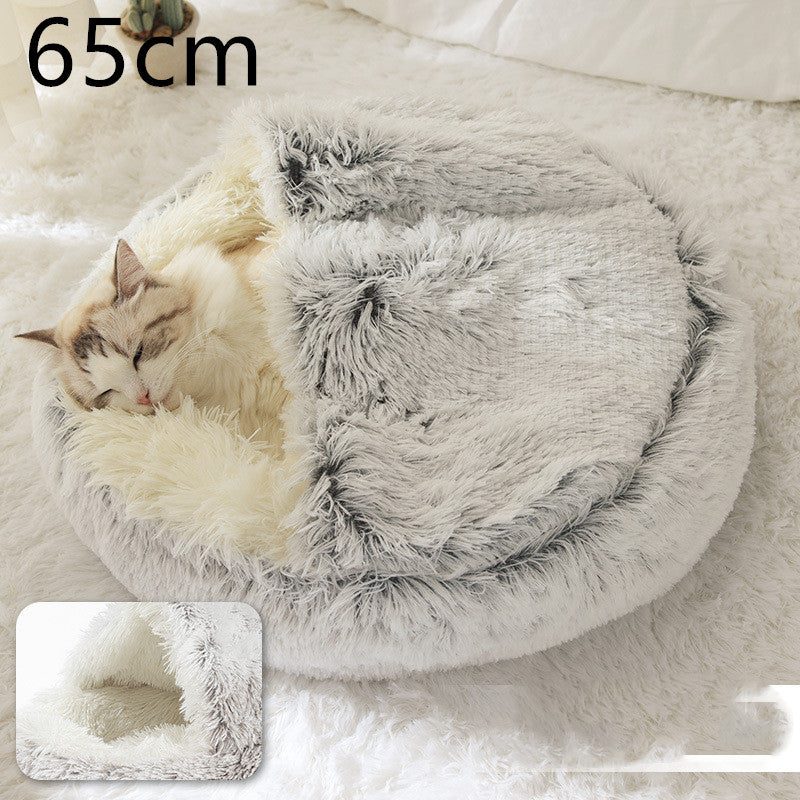 Gray and cream shag plush round pet bed with thick rim and open center; pet inside