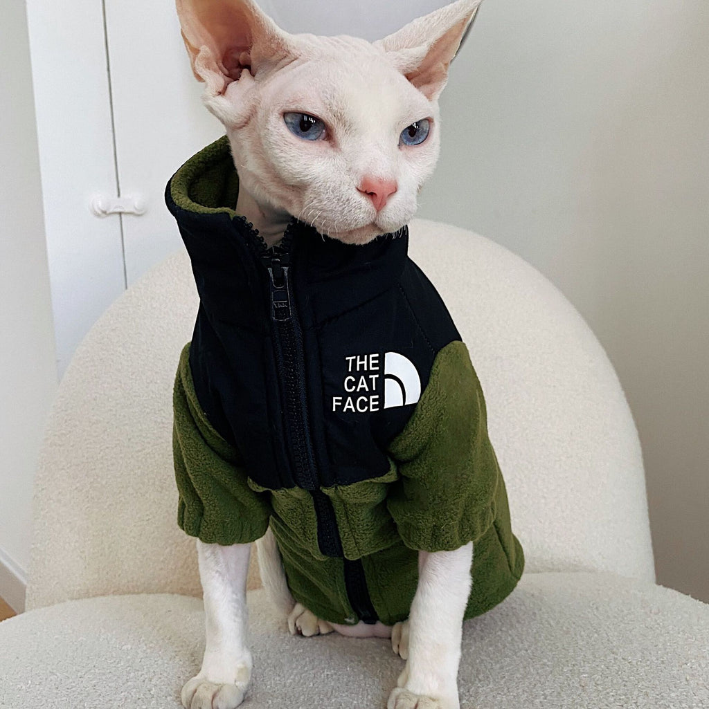 Olive green fleece cat jacket with zipper and hood, 'THE CAT FACE' chest patch.