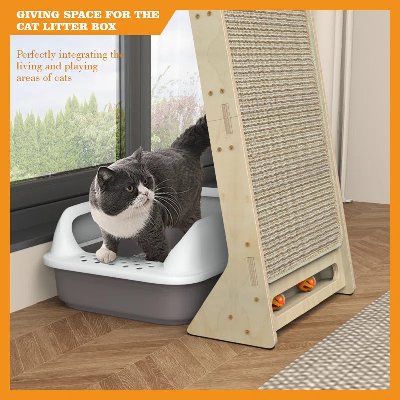 Cat tower base with hidden compartment beside scratching ramp, shown in use with cat